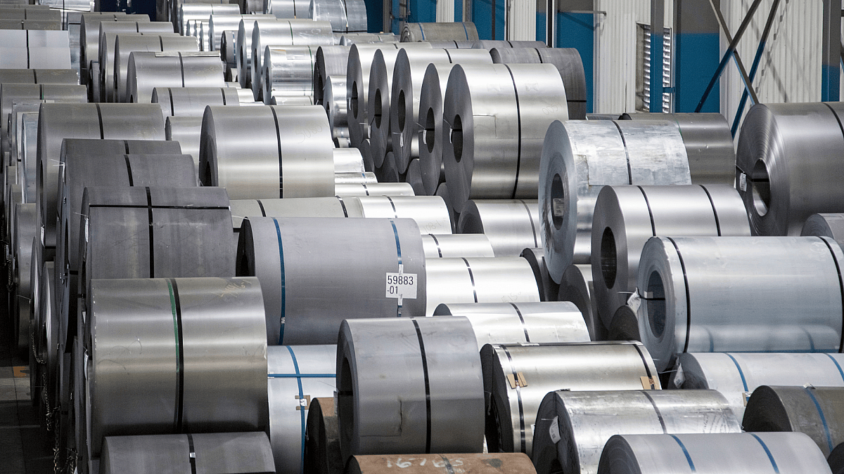 Multiple steel coils with different surface finishes used in metallurgical evaluation