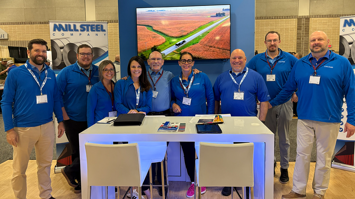 Mill Steel representatives at trade show booth