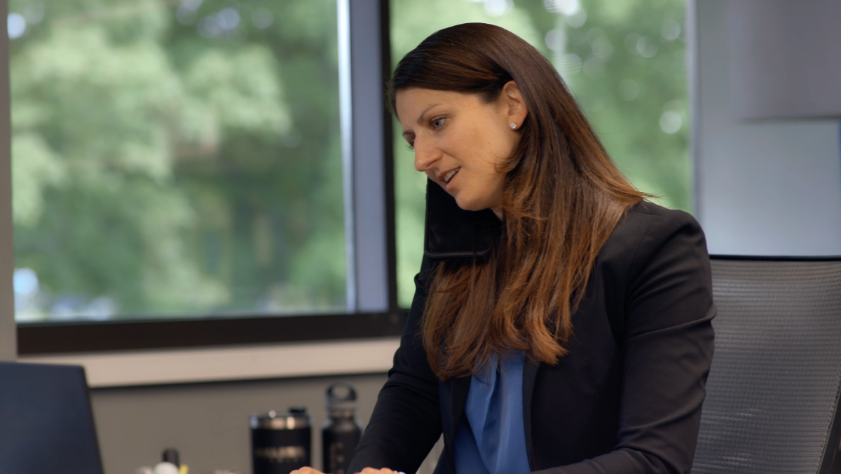 Mill Steel associate helping a customer on the phone.